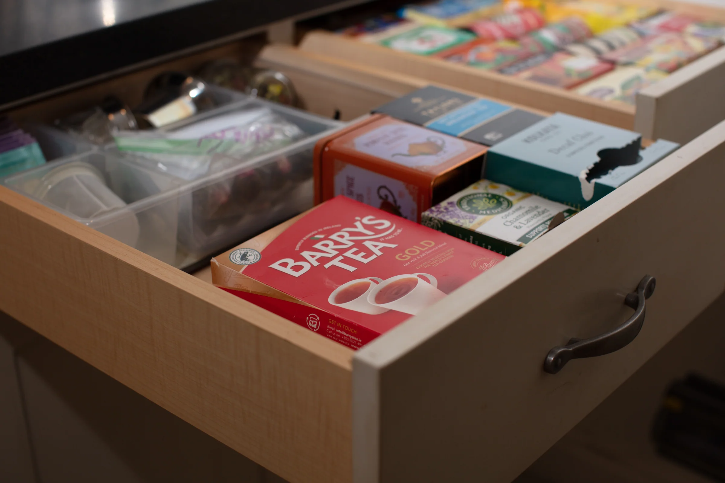 Tea sorted neatly in a kitchen drawer